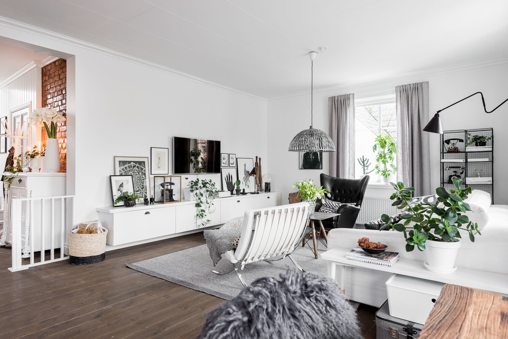 Example of a danish family room design in Gothenburg