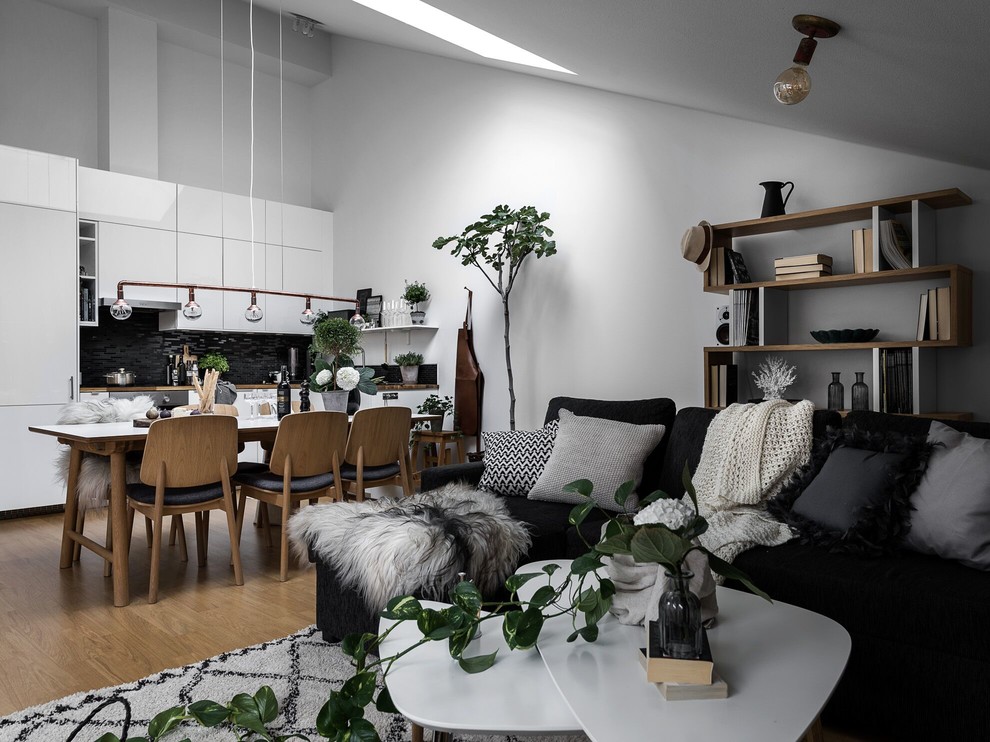 Imagen de sala de estar nórdica con paredes blancas