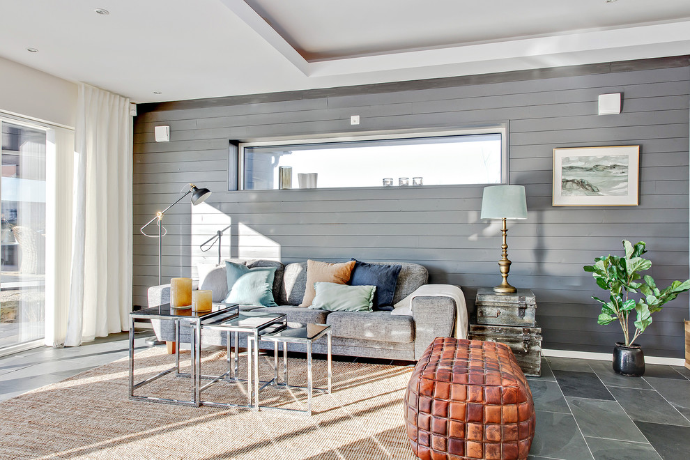 Example of a beach style family room design in Gothenburg