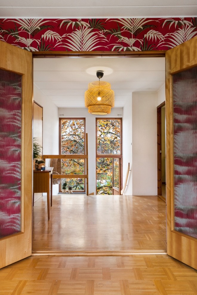 Example of a mid-century modern family room design in Stockholm