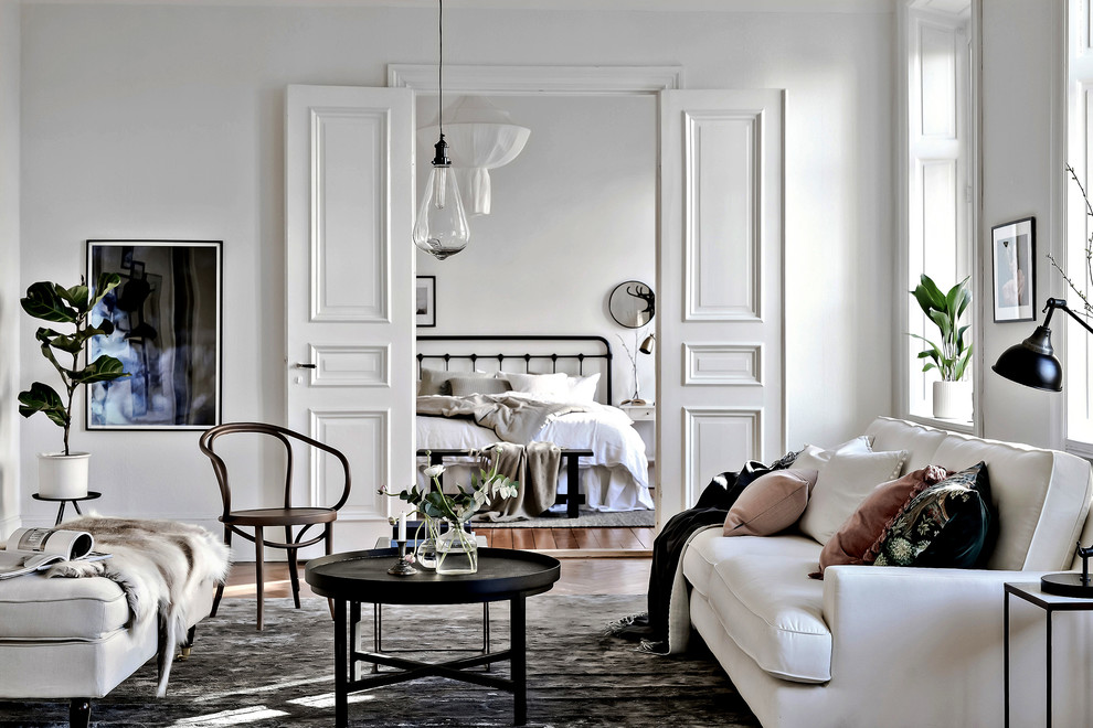 Design ideas for a scandi games room in Gothenburg with white walls, no fireplace and no tv.