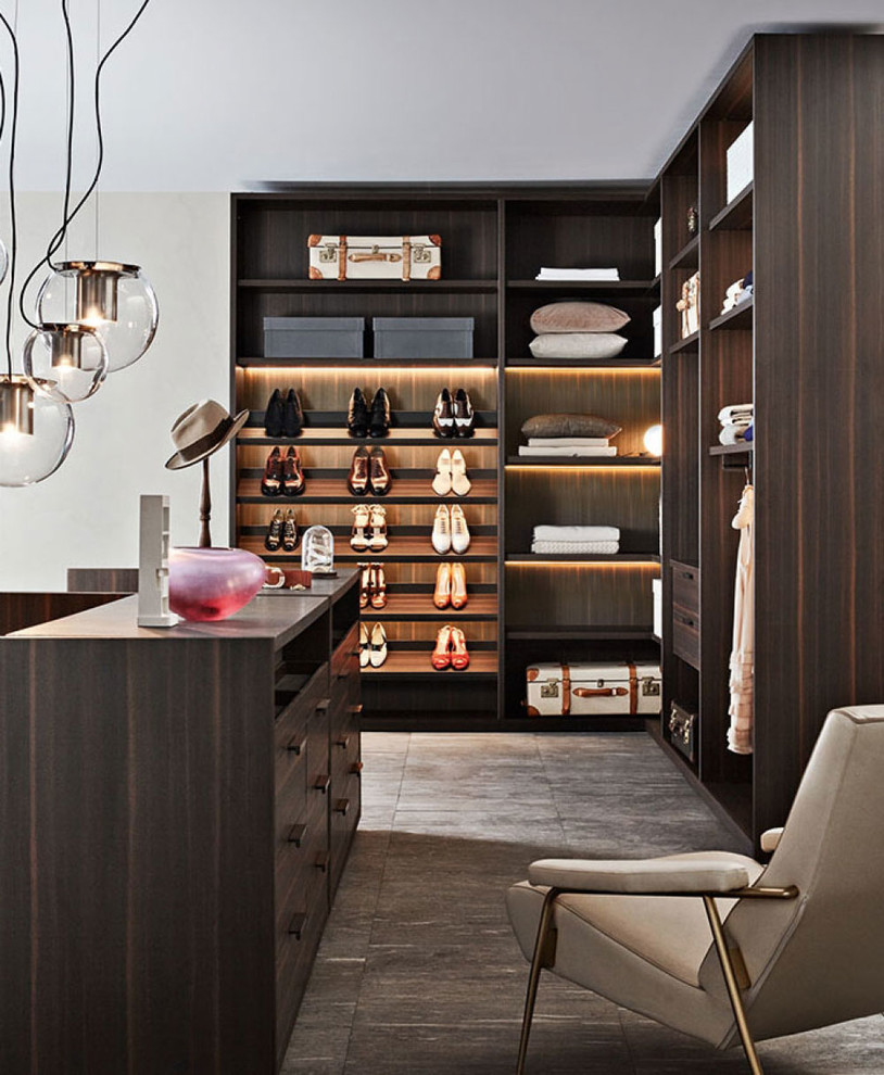 Inspiration for a mid-sized contemporary men's brown floor dressing room remodel in Munich with open cabinets and dark wood cabinets