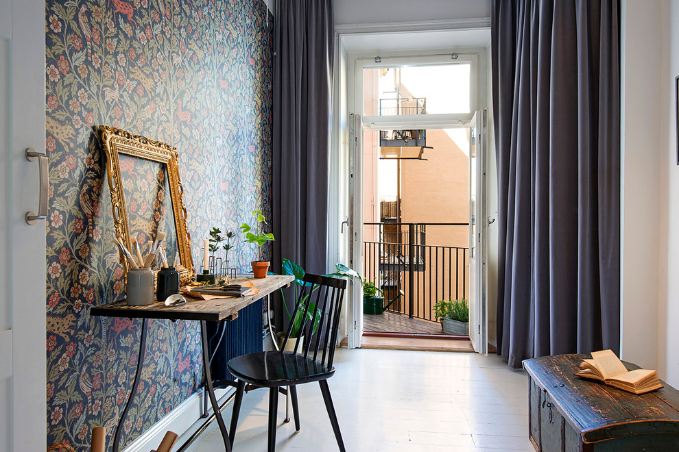 Inspiration for a medium sized scandinavian study in Stockholm with multi-coloured walls, no fireplace, a freestanding desk and painted wood flooring.