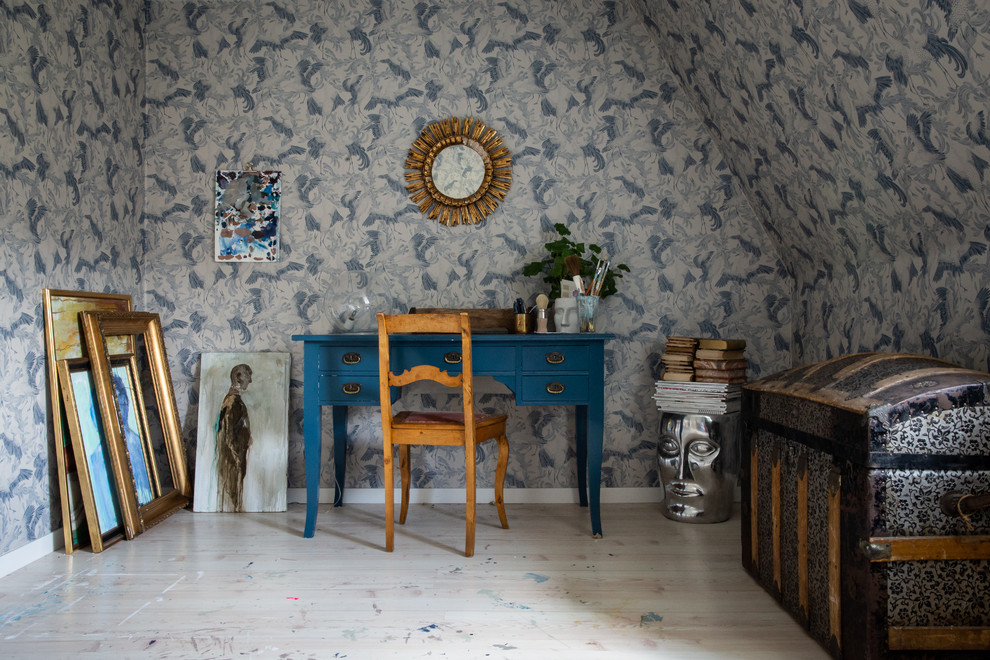 Inspiration for a medium sized bohemian home studio in Stockholm with multi-coloured walls, lino flooring, a freestanding desk and beige floors.
