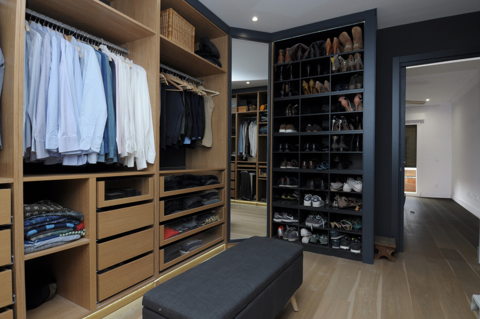 Inspiration for a large urban walk-in wardrobe for men in Madrid.