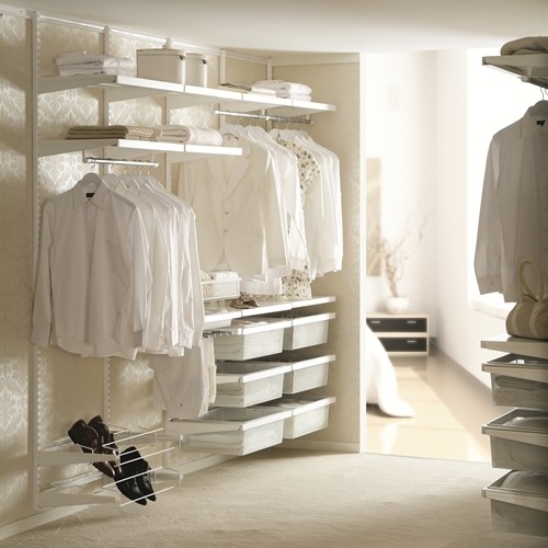 Mid-sized transitional women's dressing room photo in Other with open cabinets and white cabinets