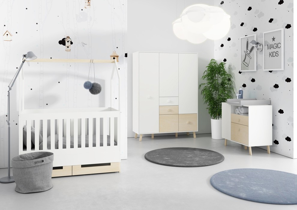 Aménagement d'une grande chambre de bébé neutre scandinave avec un mur blanc, sol en béton ciré et un sol gris.