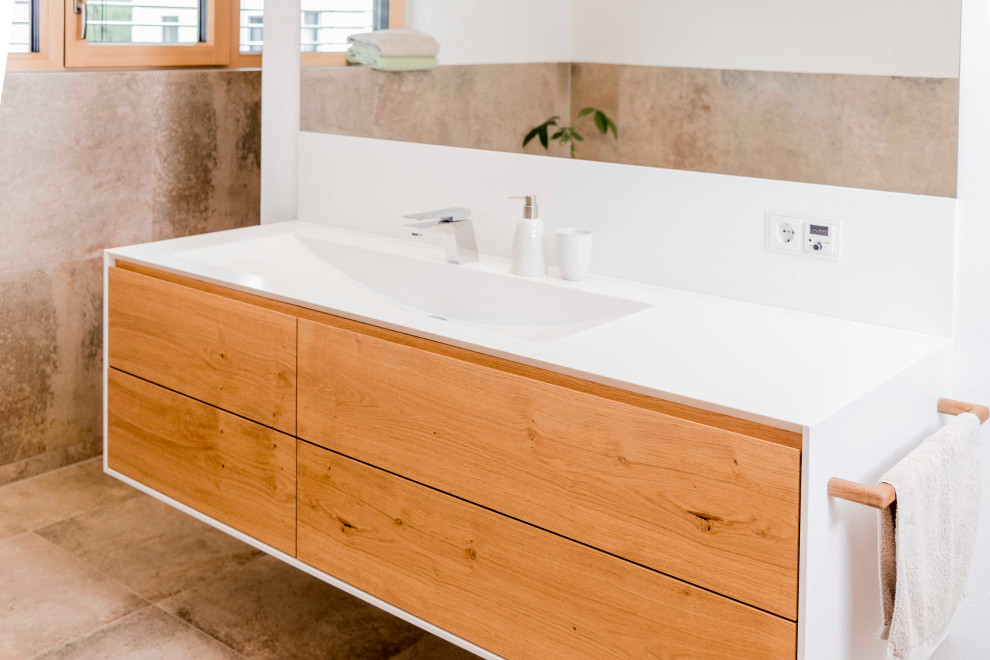 Foto di una stanza da bagno minimal di medie dimensioni con vasca freestanding, lavabo da incasso, top in superficie solida, top bianco, un lavabo e mobile bagno incassato