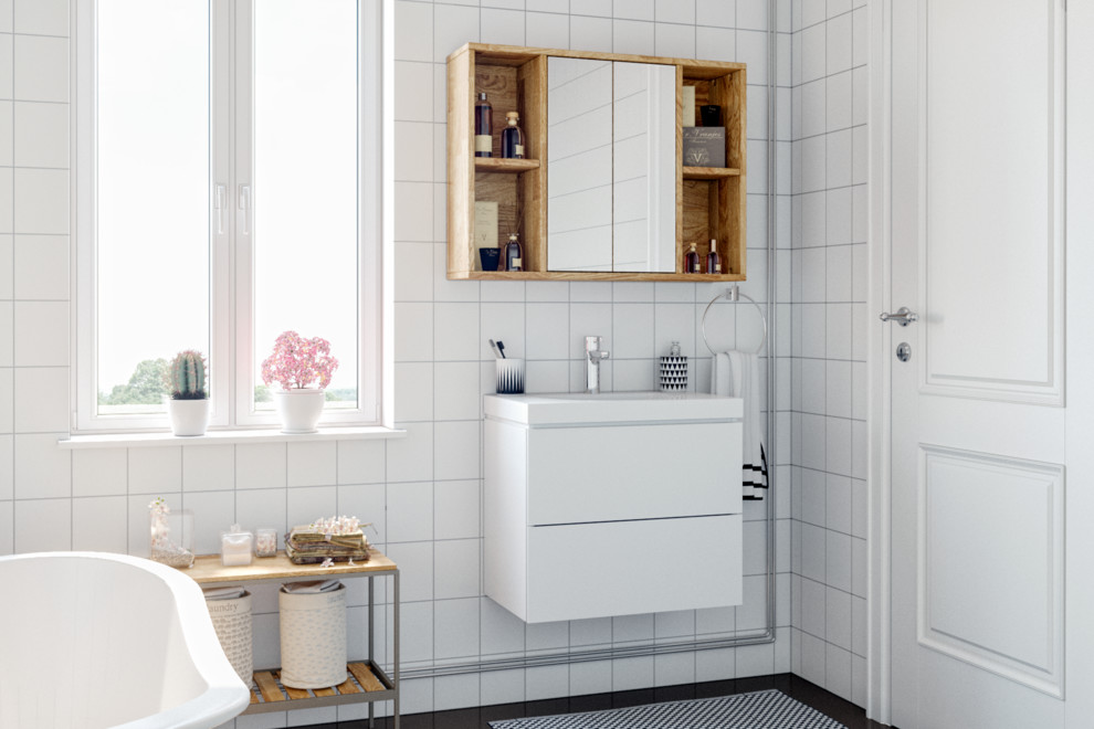 Ejemplo de cuarto de baño contemporáneo con puertas de armario blancas, bañera exenta, ducha a ras de suelo, sanitario de pared, baldosas y/o azulejos blancos, paredes blancas, aseo y ducha, lavabo encastrado, encimera de madera y suelo negro