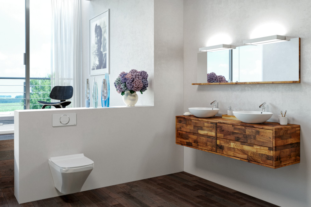 Inspiration for a contemporary 3/4 dark wood floor and brown floor bathroom remodel in Berlin with brown cabinets, a wall-mount toilet, white walls, a vessel sink and wood countertops