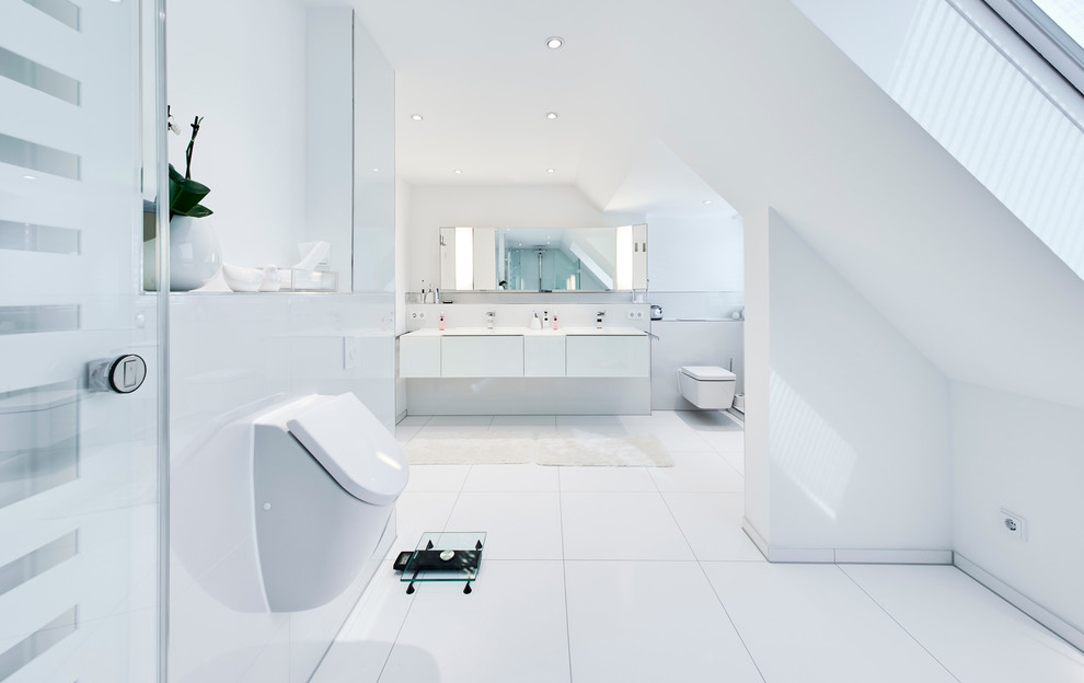 Bathroom - large modern ceramic tile bathroom idea in Cologne with white cabinets, an urinal and white walls