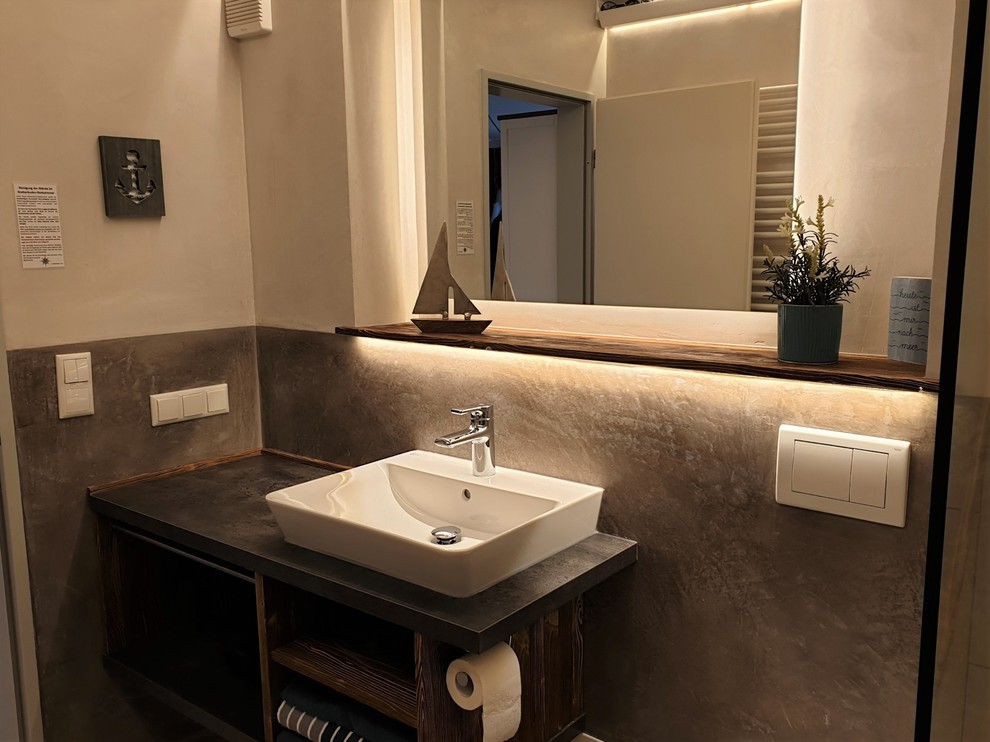 This is an example of a small scandinavian bathroom in Other with brown cabinets, a built-in shower, a two-piece toilet, white tiles, ceramic tiles, white walls, ceramic flooring, a vessel sink, wooden worktops, brown floors, an open shower and grey worktops.
