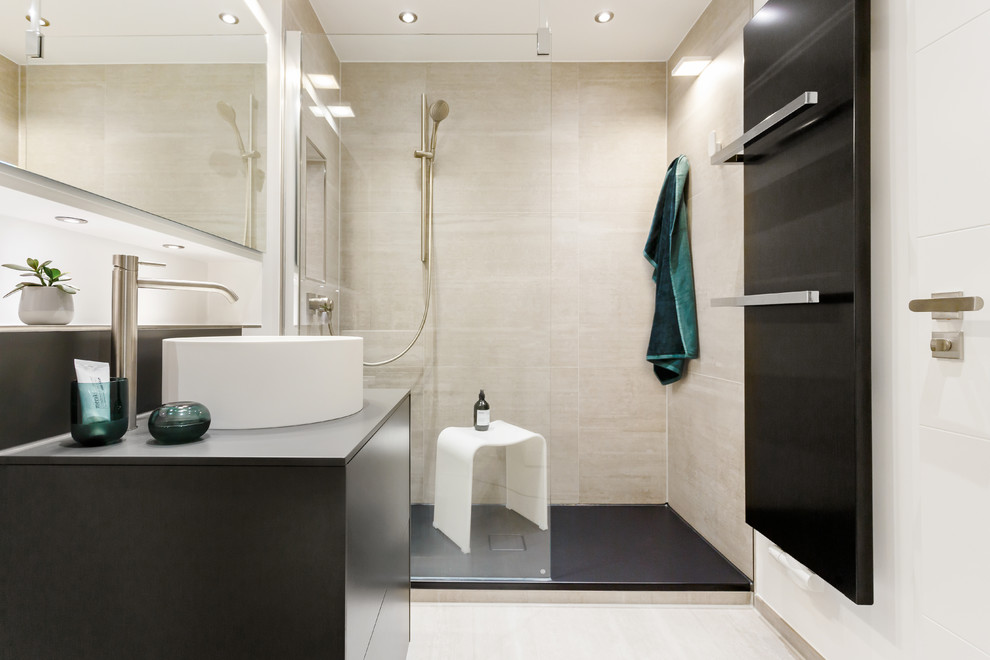 Photo of a small contemporary shower room bathroom in Cologne with flat-panel cabinets, a built-in shower, a wall mounted toilet, beige tiles, stone tiles, white walls, concrete flooring, a vessel sink, solid surface worktops, beige floors and an open shower.