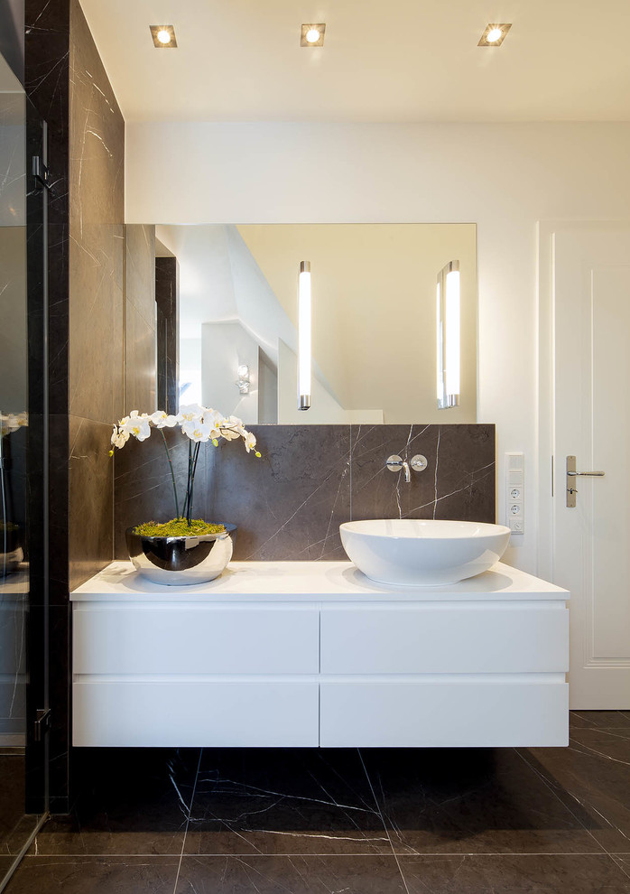Walk-in shower - mid-sized traditional marble floor walk-in shower idea in Dusseldorf with flat-panel cabinets, white cabinets, a vessel sink, wood countertops and white walls