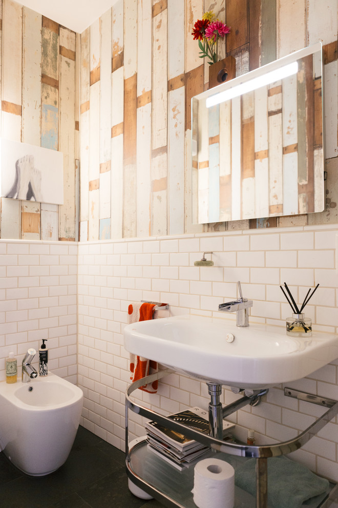 Example of a mid-sized eclectic white tile and subway tile bathroom design in Berlin with open cabinets, a bidet, multicolored walls and a console sink