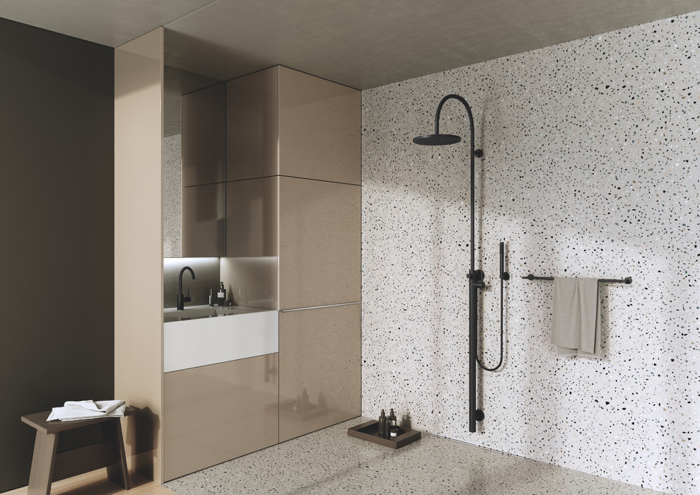 На фото: ванная комната среднего размера в стиле модернизм с плоскими фасадами, бежевыми фасадами, открытым душем, разноцветной плиткой, белыми стенами, душевой кабиной, монолитной раковиной, разноцветным полом и белой столешницей с