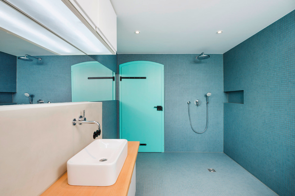 Photo of a large contemporary bathroom in Stuttgart with shaker cabinets, white cabinets, white walls, porcelain flooring, wooden worktops, grey floors, brown worktops, a single sink and a freestanding vanity unit.