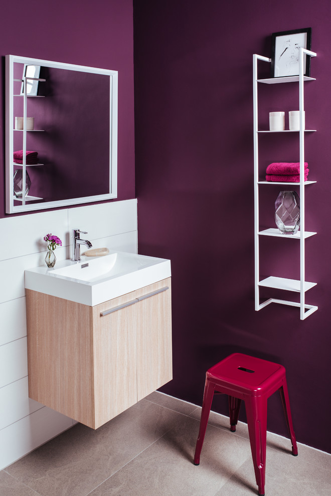 Bathroom - small contemporary 3/4 white tile cement tile floor and brown floor bathroom idea in Berlin with flat-panel cabinets, light wood cabinets, purple walls and a drop-in sink