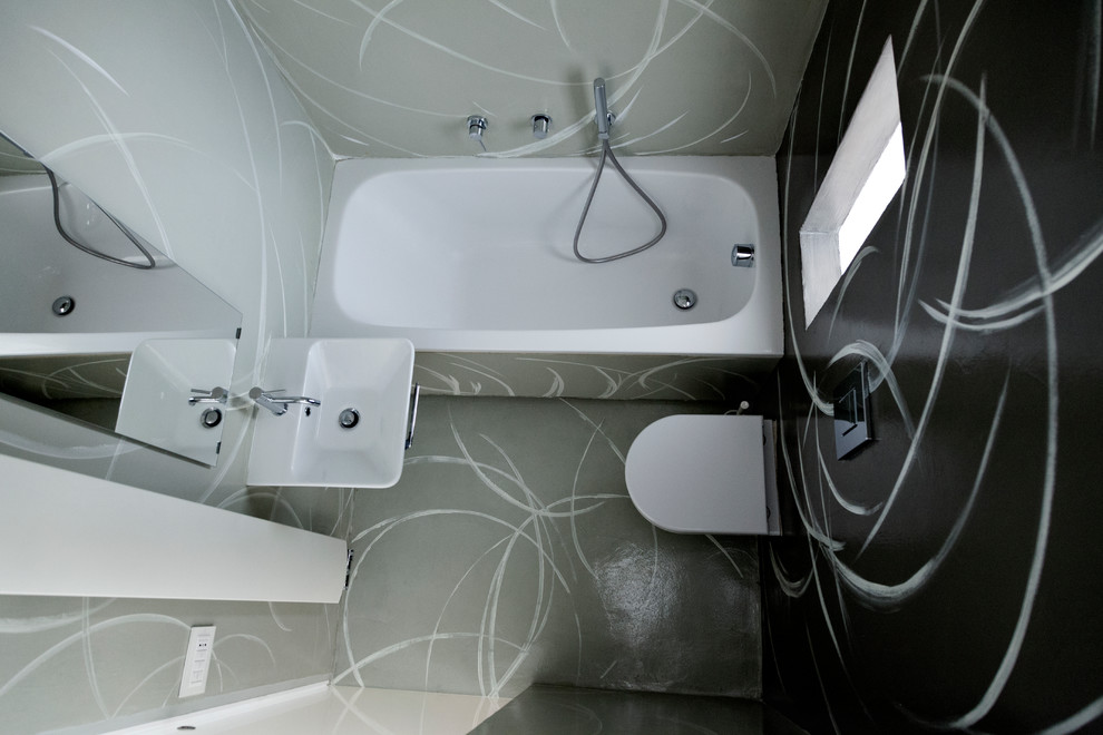 Foto di un piccolo bagno di servizio contemporaneo con WC sospeso, pareti grigie e lavabo sospeso