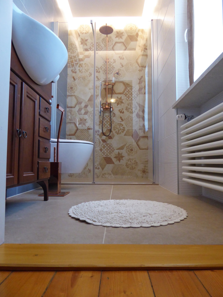 Small modern cloakroom in Venice with freestanding cabinets, brown cabinets, a two-piece toilet, orange tiles, porcelain tiles, blue walls, porcelain flooring, an integrated sink, tiled worktops, beige floors, white worktops, a freestanding vanity unit, a drop ceiling and panelled walls.