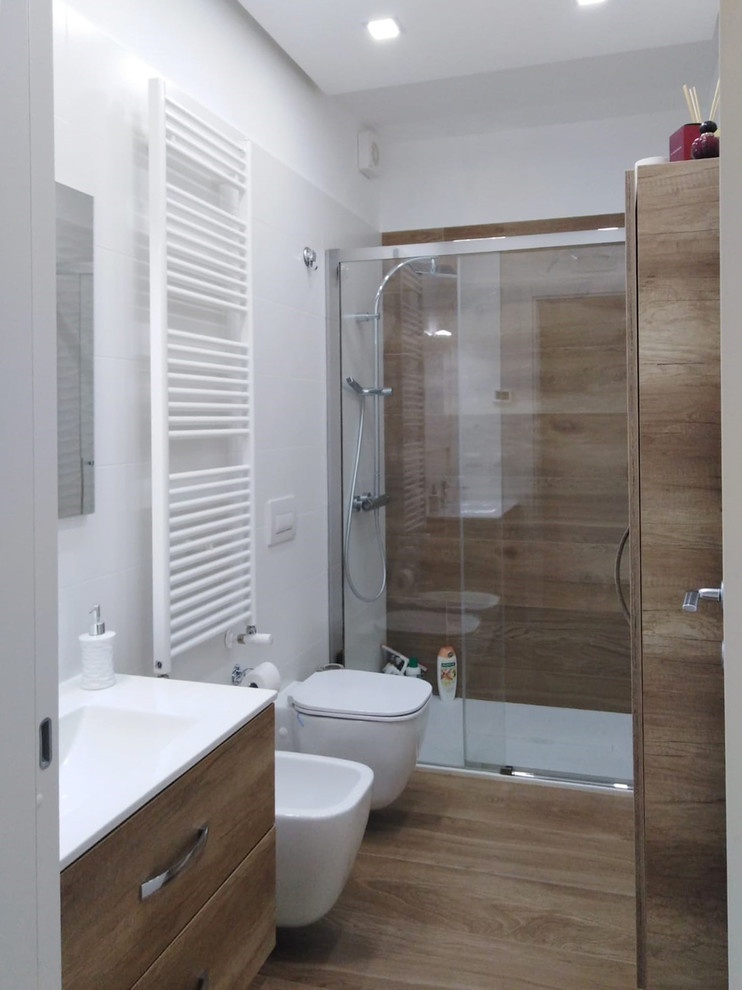Photo of a medium sized contemporary bathroom in Other with flat-panel cabinets, brown cabinets, a two-piece toilet, beige tiles, porcelain tiles, white walls, porcelain flooring, an integrated sink, solid surface worktops, brown floors and white worktops.