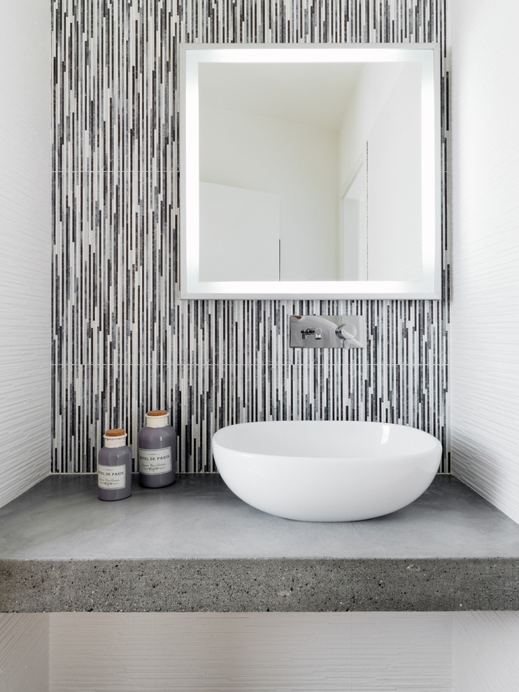 Design ideas for a contemporary cloakroom in Other with multi-coloured tiles, matchstick tiles, a vessel sink, concrete worktops, grey worktops and multi-coloured walls.