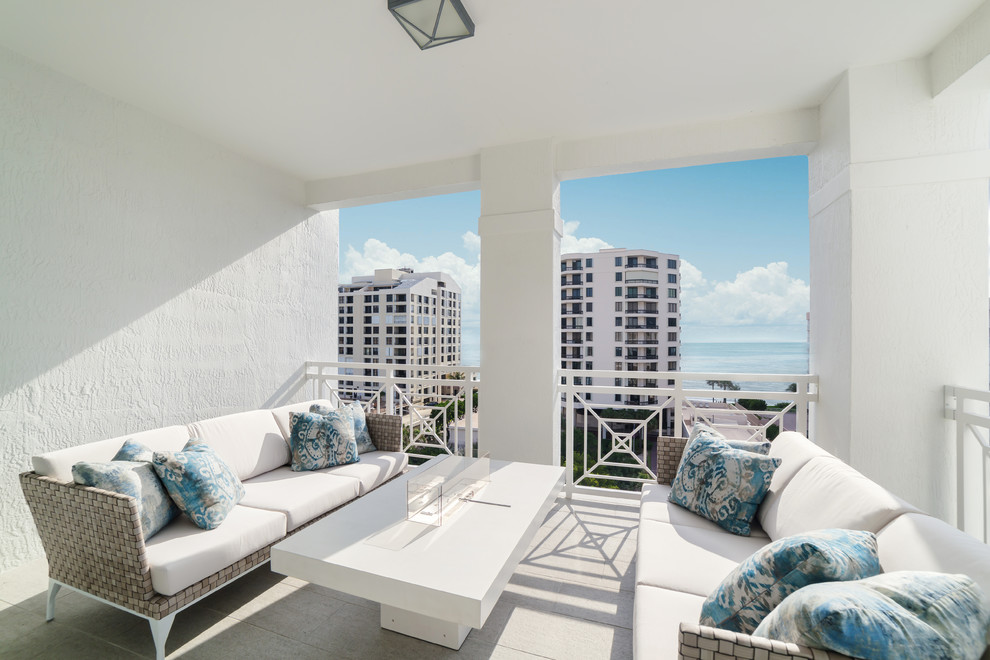 Photo of a medium sized coastal balcony in Miami.