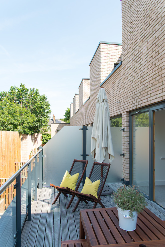 Inspiration for a mid-sized contemporary balcony remodel in London
