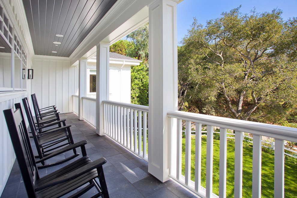Example of a classic balcony design in Los Angeles with a roof extension