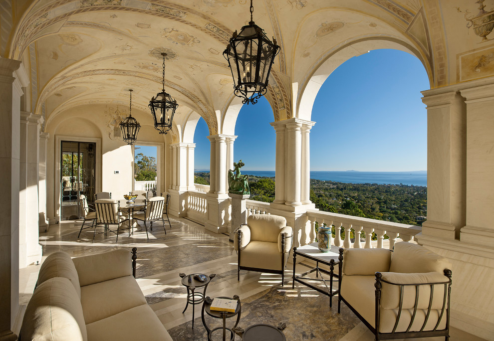 Photo of a mediterranean balcony in Santa Barbara with a roof extension.