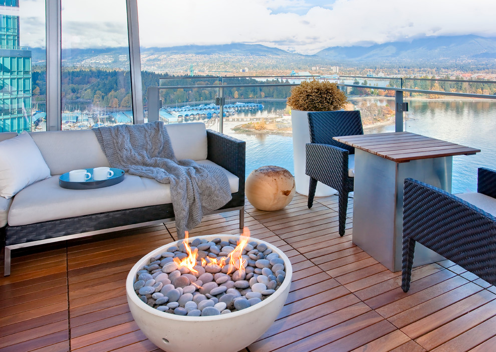 Contemporary balcony in Vancouver with a fire feature.