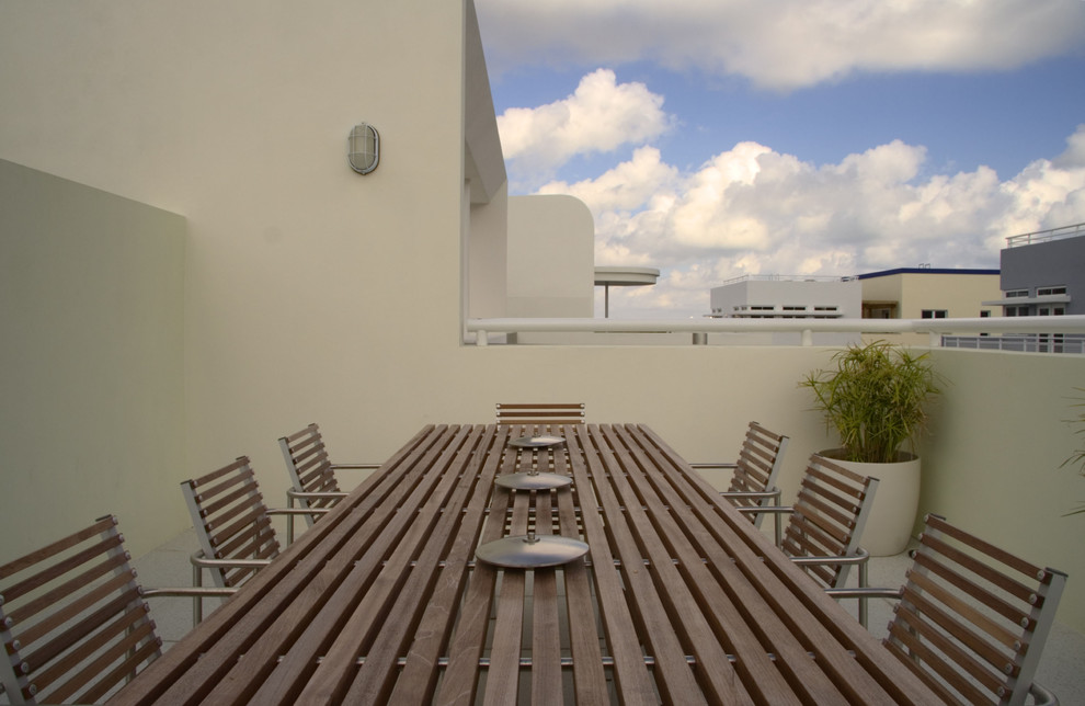 Balcony - small contemporary balcony idea in Miami with no cover
