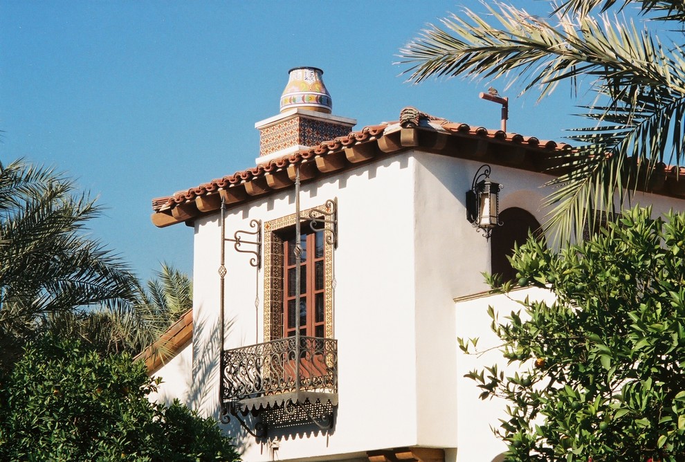 Balcony - small traditional balcony idea in Santa Barbara with an awning