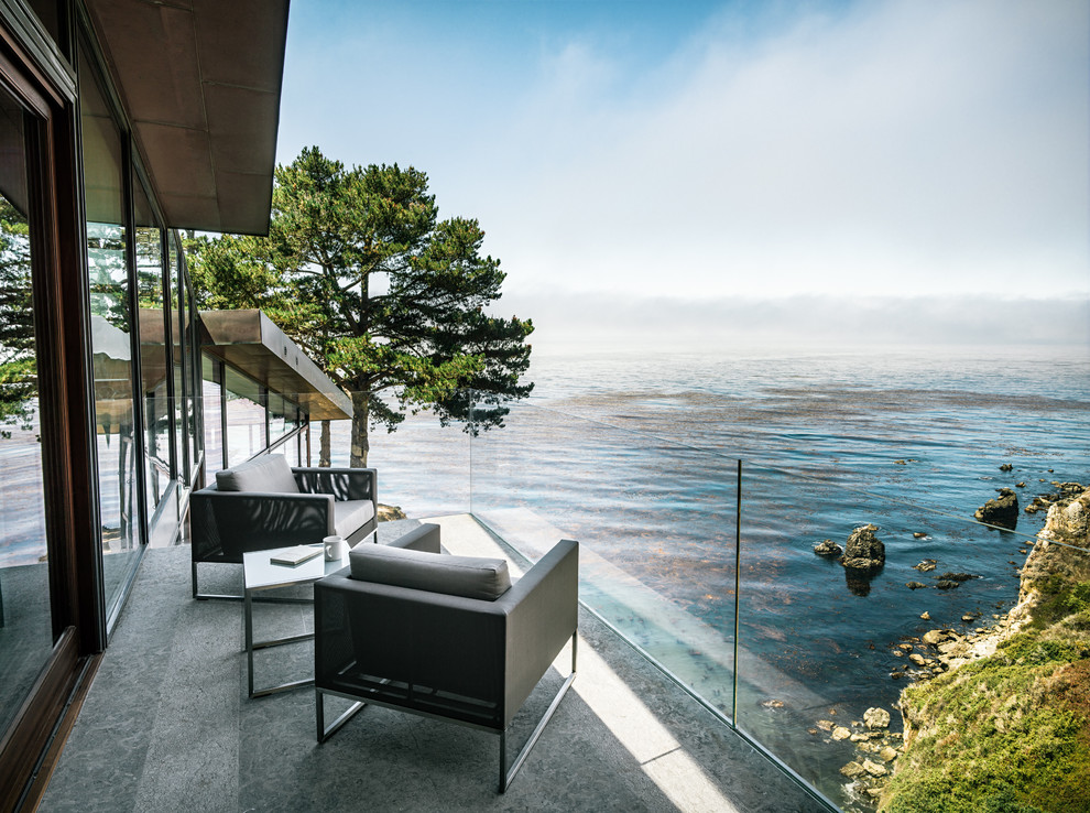 Inspiration for a medium sized contemporary balcony in San Francisco with a roof extension.