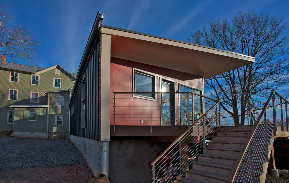 Inspiration pour un balcon minimaliste de taille moyenne avec une extension de toiture.