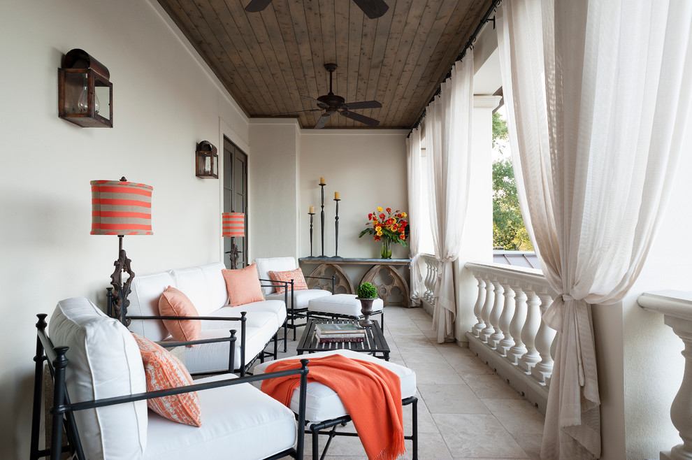 Balcony - mediterranean balcony idea in Houston with a roof extension