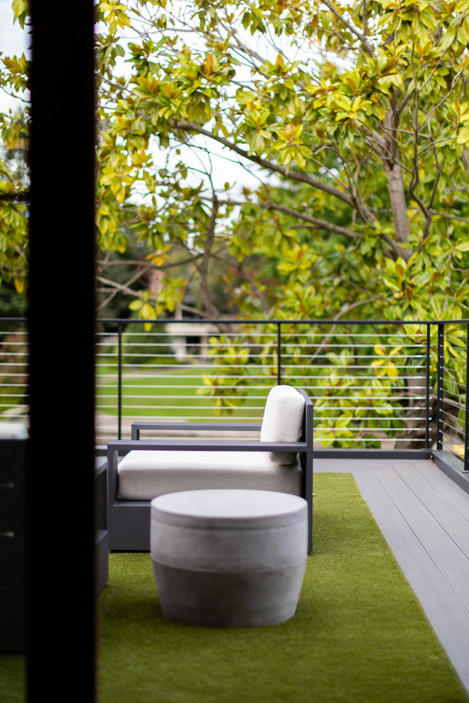 Inspiration for a large contemporary cable railing balcony remodel in Seattle with no cover