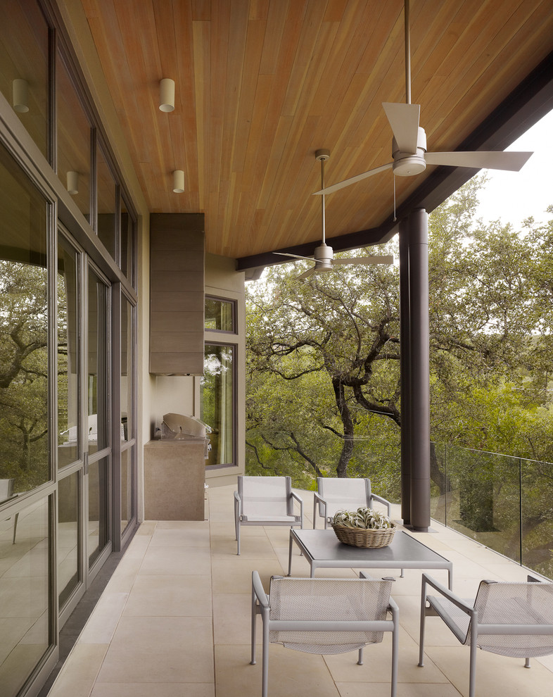 Design ideas for a contemporary balcony in Austin with a bbq area.