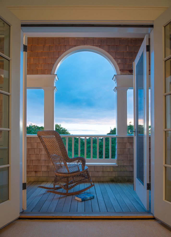 This is an example of a beach style balcony in Boston.