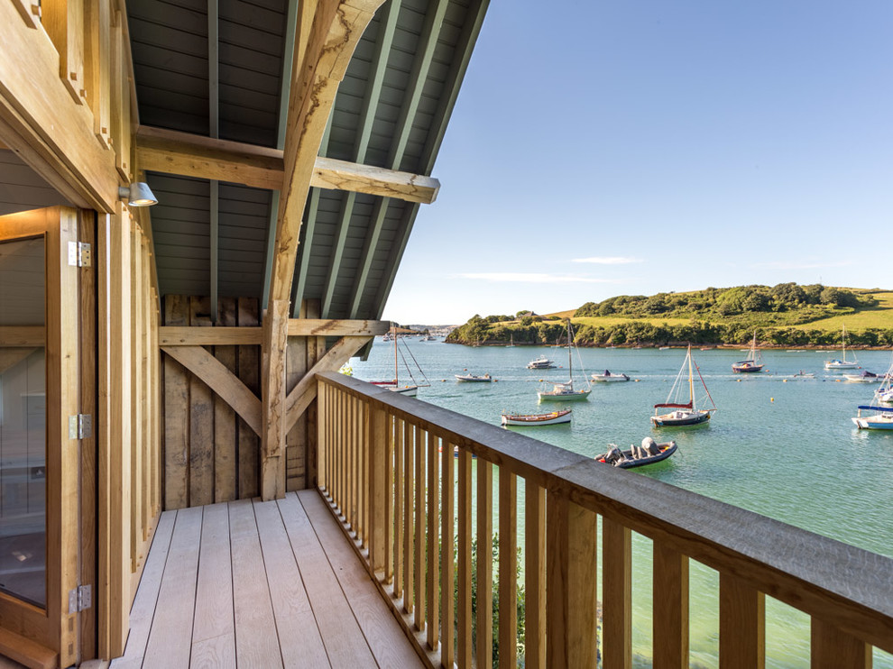 Design ideas for a medium sized nautical wood railing balcony in Devon.