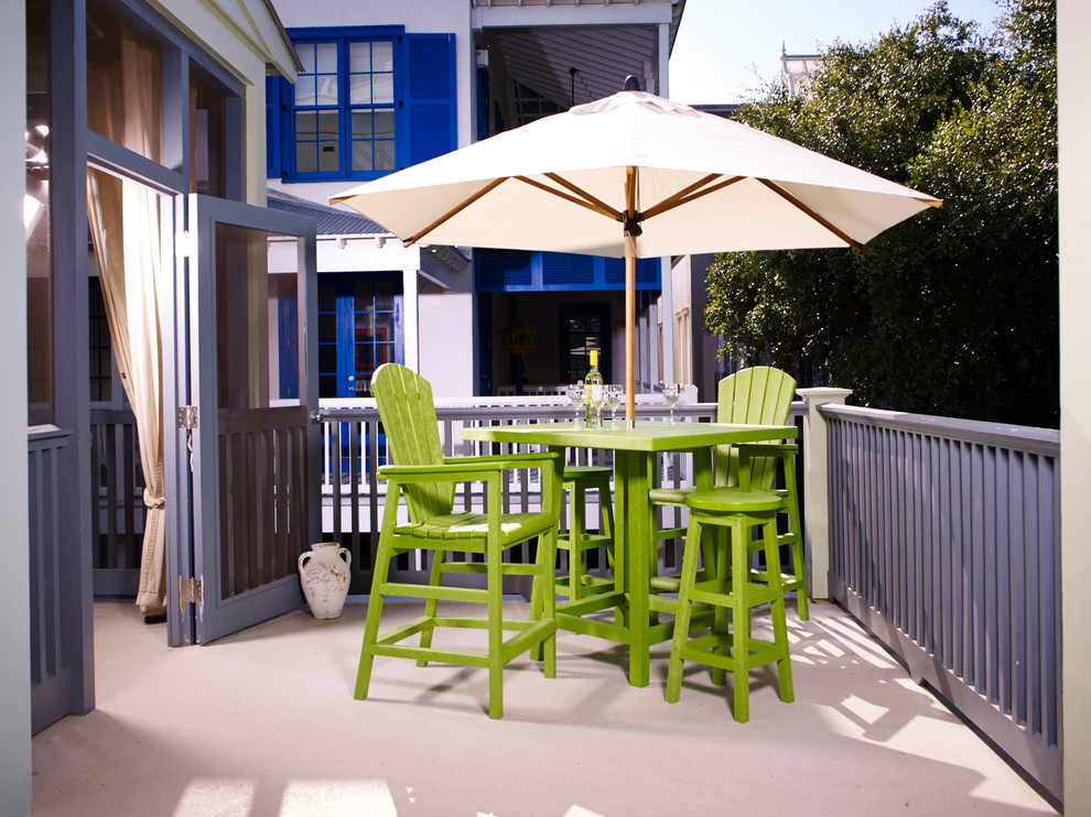 Design ideas for a medium sized nautical balcony in Other with no cover.