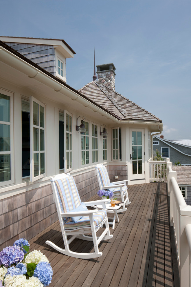 Mid-sized beach style balcony container garden photo in Boston with no cover