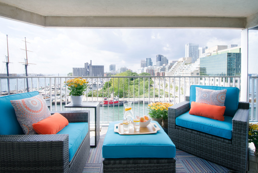 Example of a small beach style balcony design in Toronto