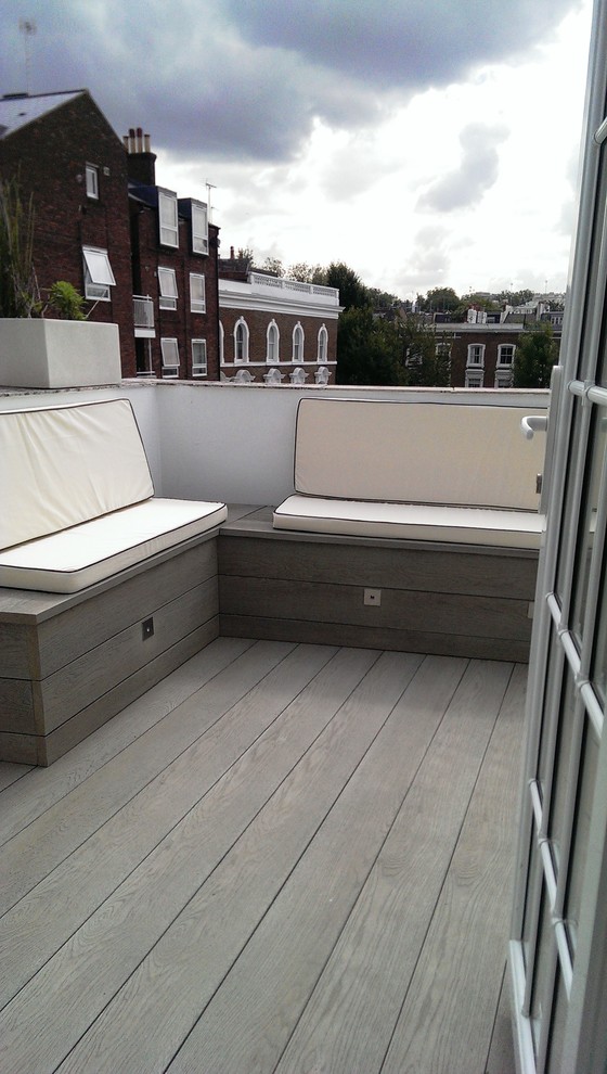 Small modern balcony in London with no cover.