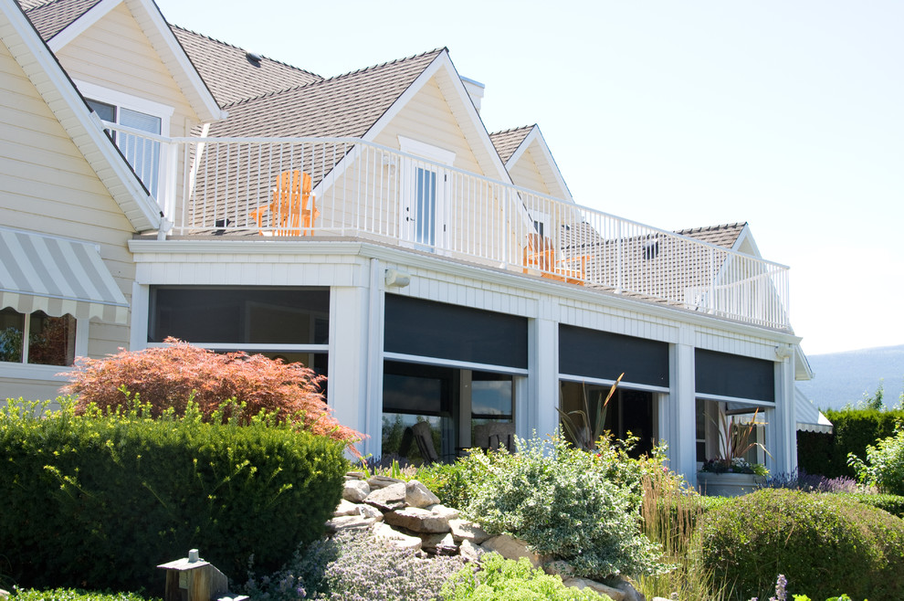 Retractable screens help bring the outside in Kelowna BC Traditional Balcony Vancouver