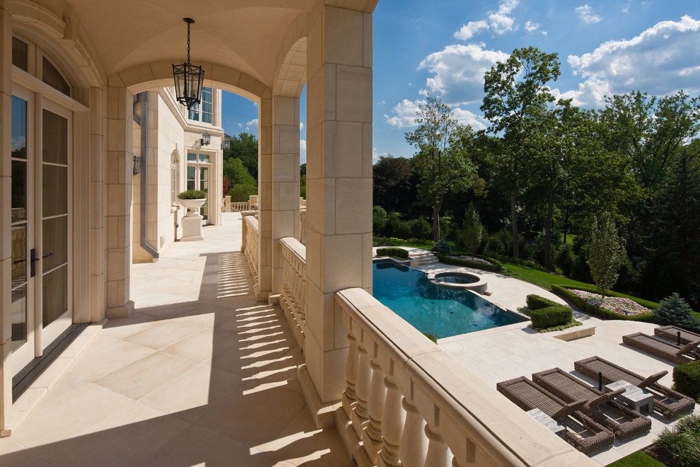 Inspiration for a classic balcony in New York with a roof extension.