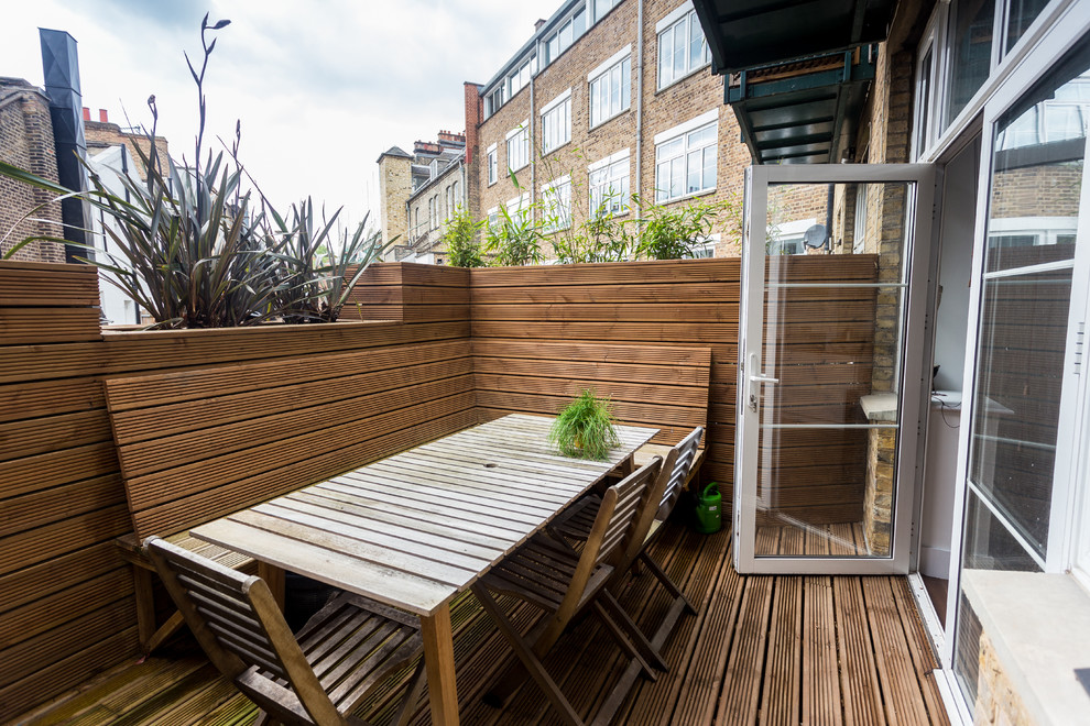 Photo of a contemporary private balcony in London with no cover.
