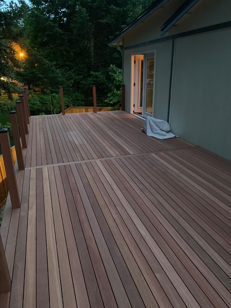 Inspiration for a large craftsman wood railing deck remodel in Seattle