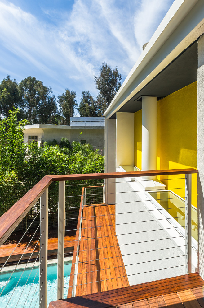 This is an example of a large midcentury balcony in Los Angeles.