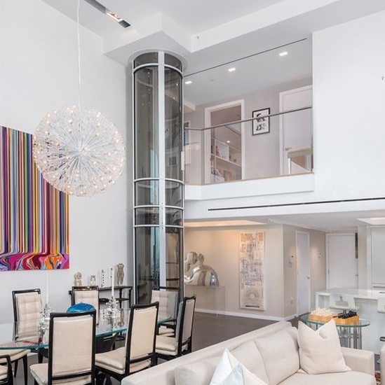 Small trendy glass railing balcony photo in Boston
